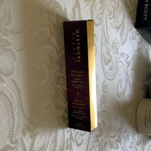 West ore beauty 60 second eye-effects tinted firming gel light/medium